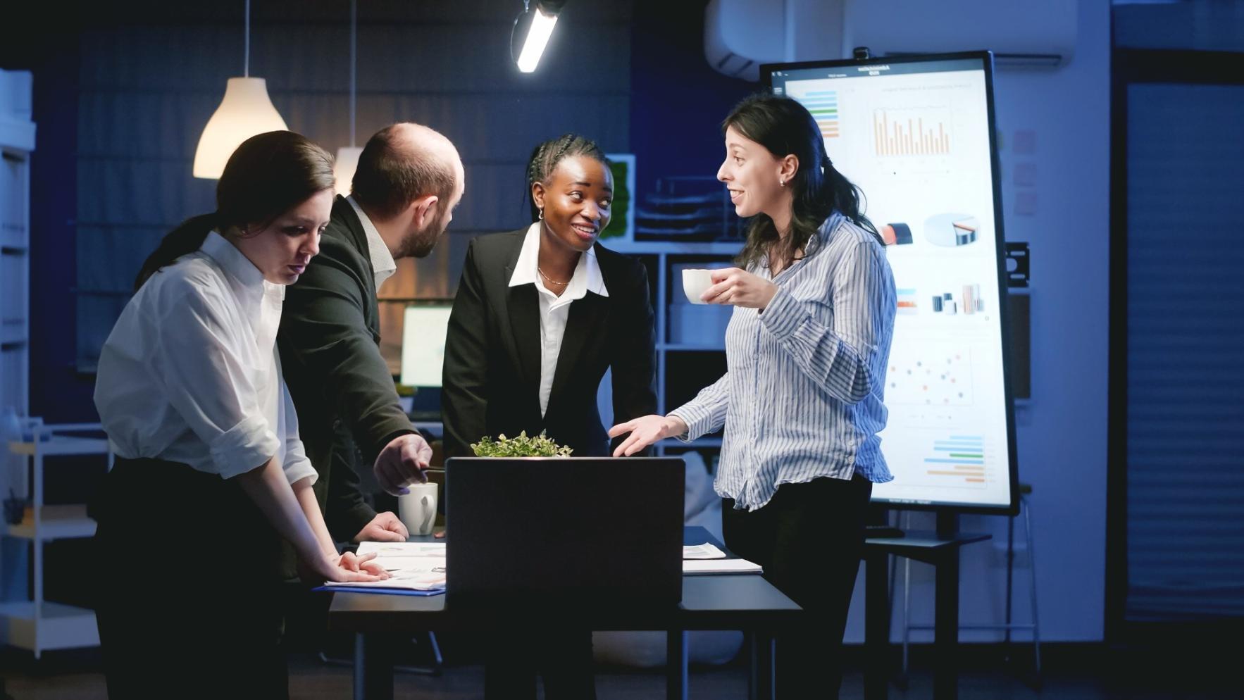 Person reviewing financial documents and taking notes during learning session
