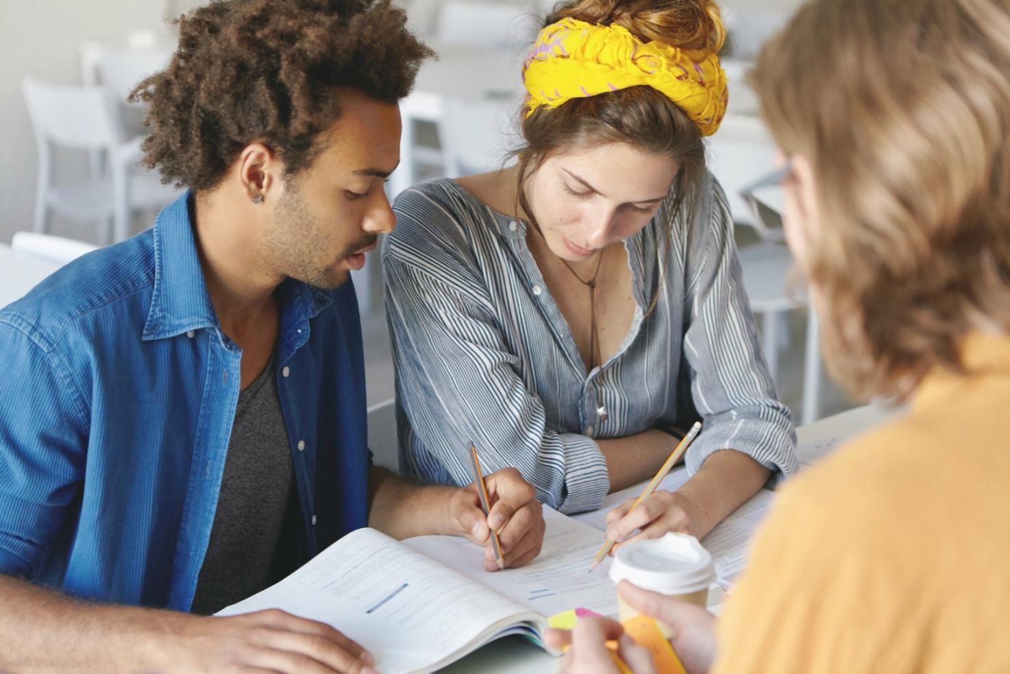 Close-up of financial planning materials and calculator on desk