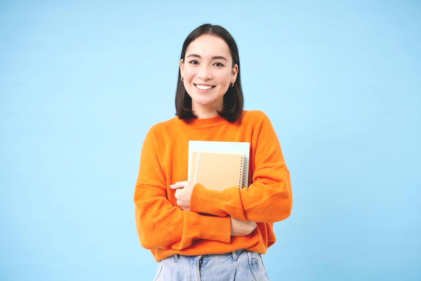 Instructor explaining budgeting concepts on whiteboard to engaged learners